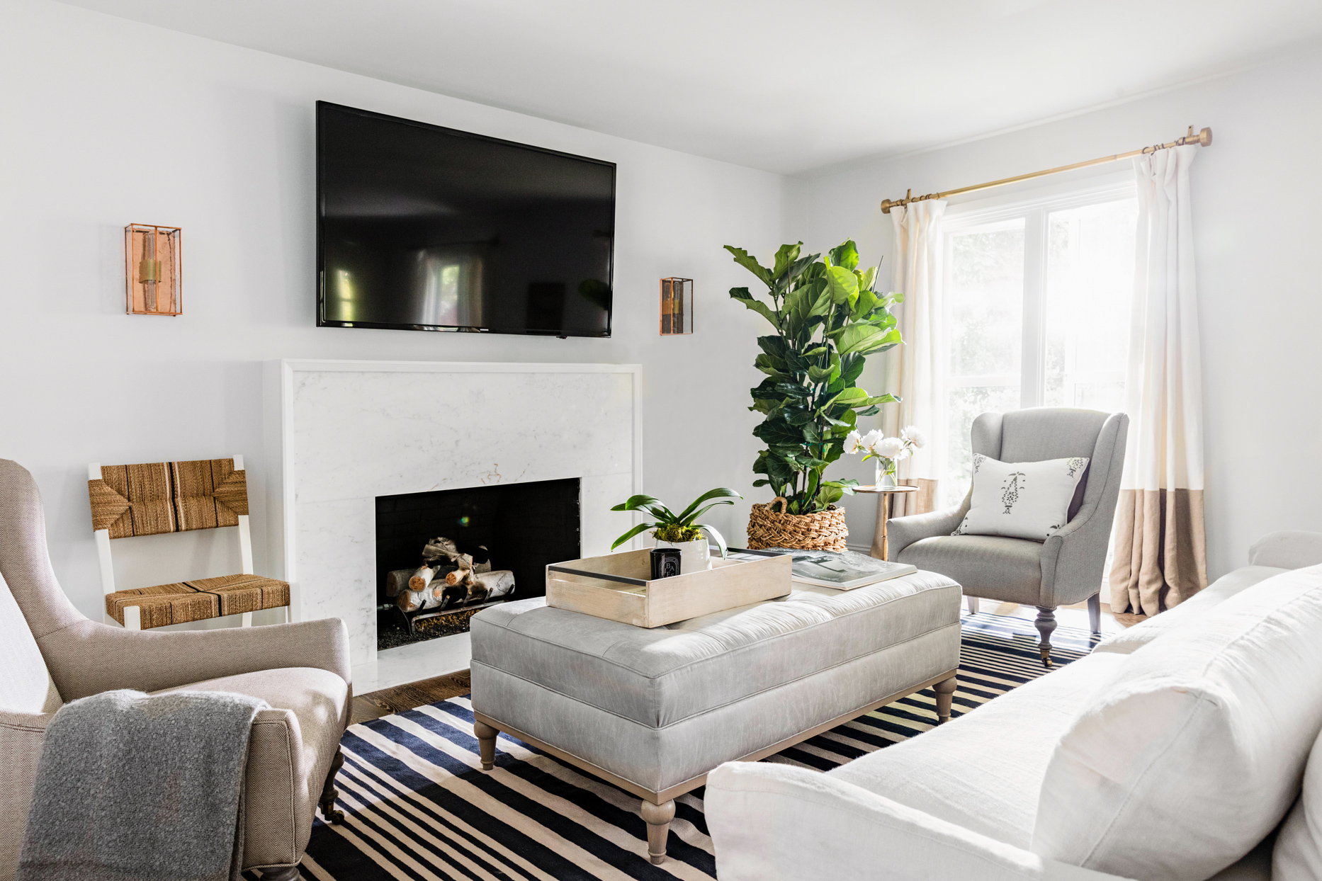 Conversation seating layout for a house party in a living room.