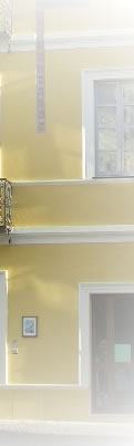 Traditional balcony detail above the entrance of the property